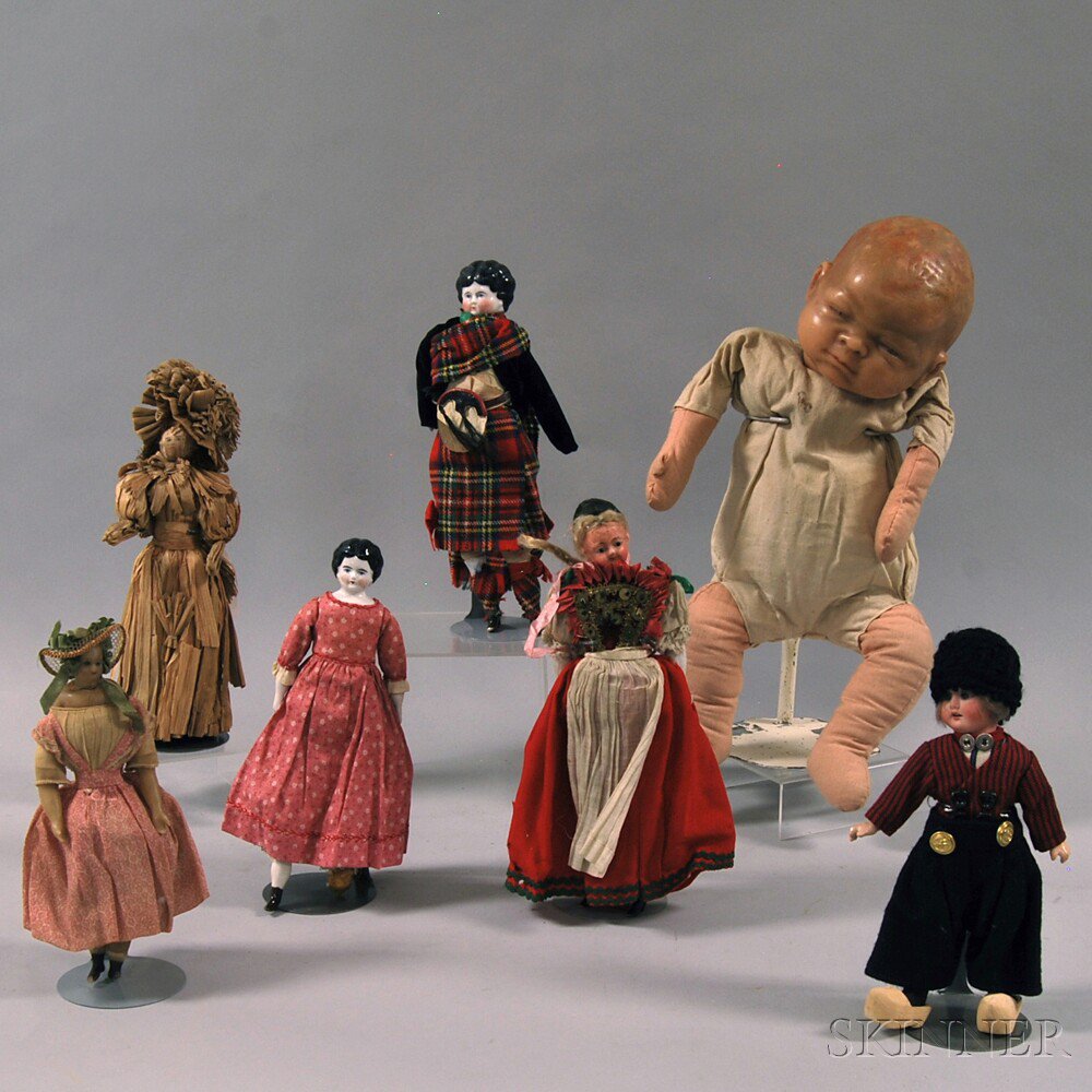 Appraisal: Seven Wax Bisque China and Straw Dolls America and Europe