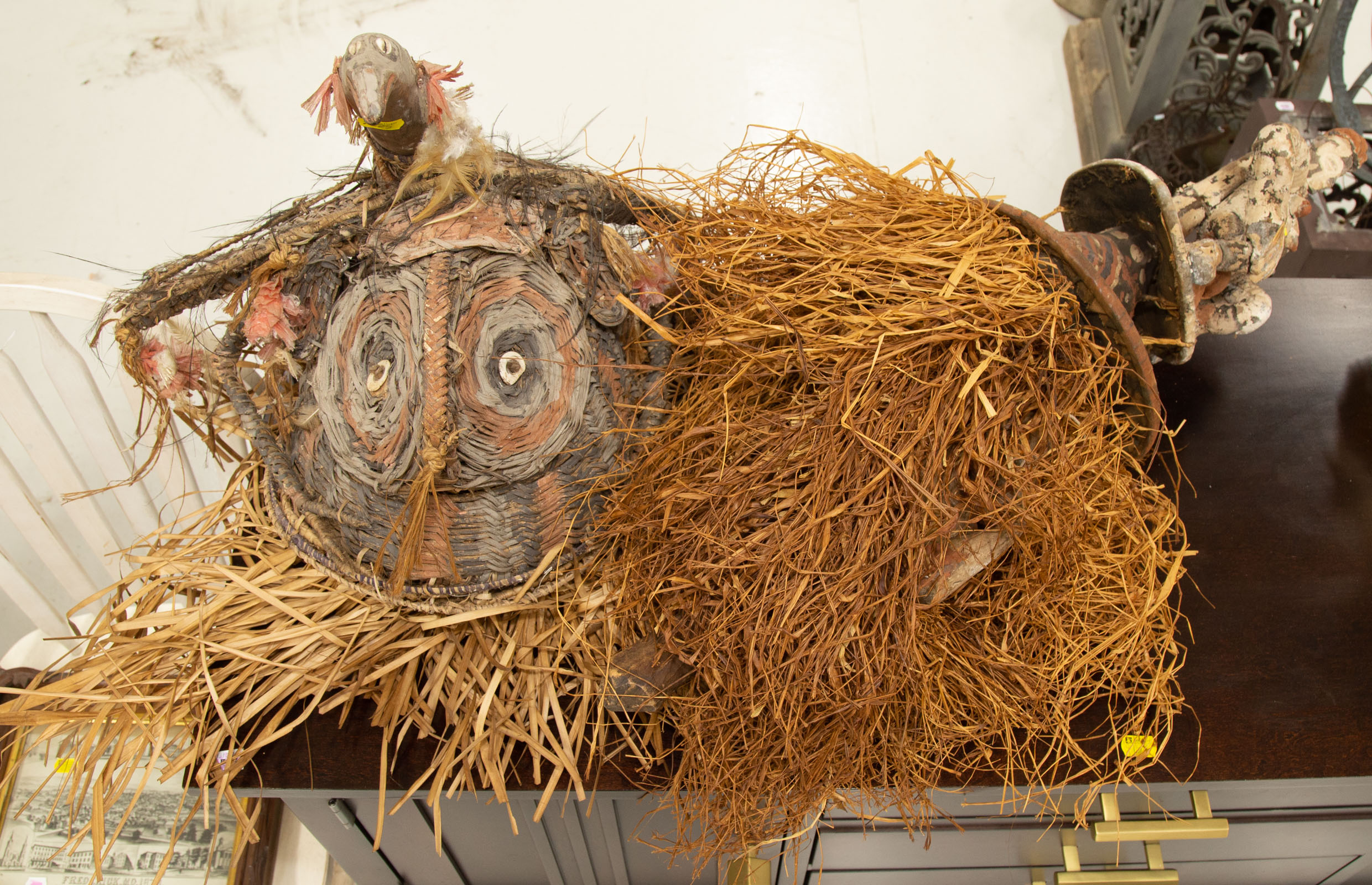 Appraisal: A MASK FROM AFRICA ANOTHER FROM NEW GUINEA th century