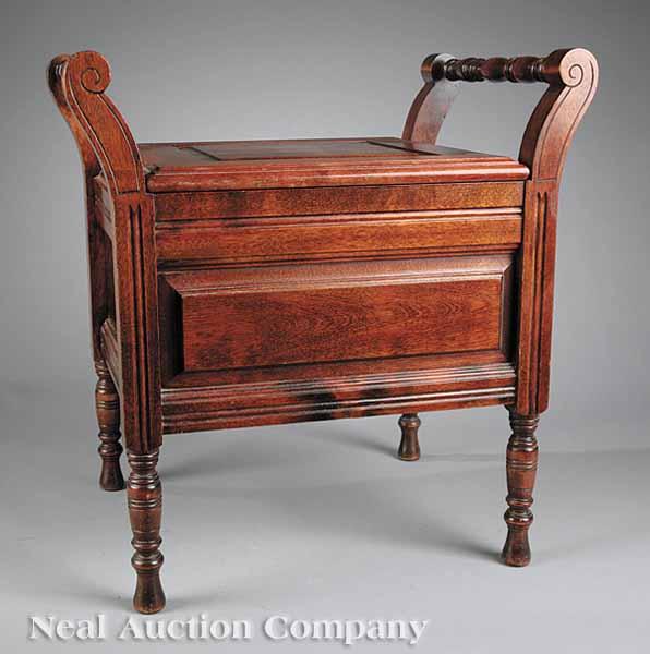 Appraisal: A Late Victorian Mahogany Commode Stool with turned handles lift