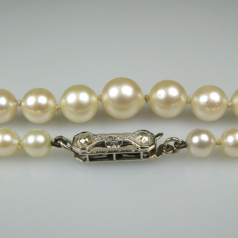 Appraisal: Single Strand Graduated Pearl Necklace mm to mm with a