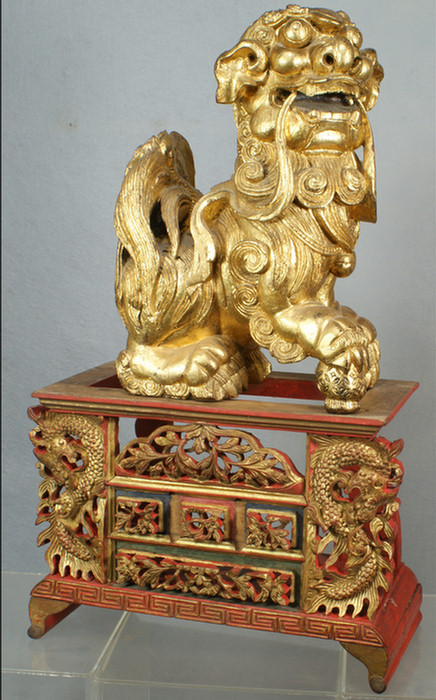 Appraisal: Chinese red and gold lacquered base and a carved and