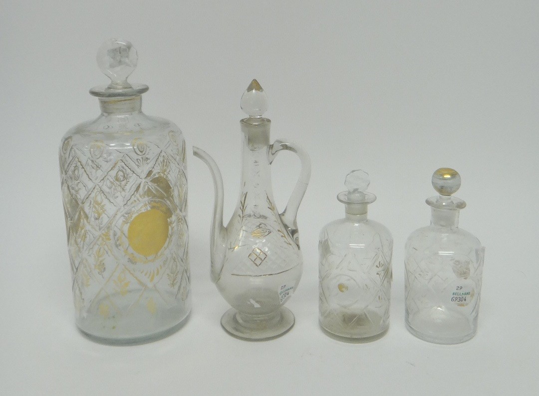 Appraisal: A group of three Beykoz glass bottles and stoppers and