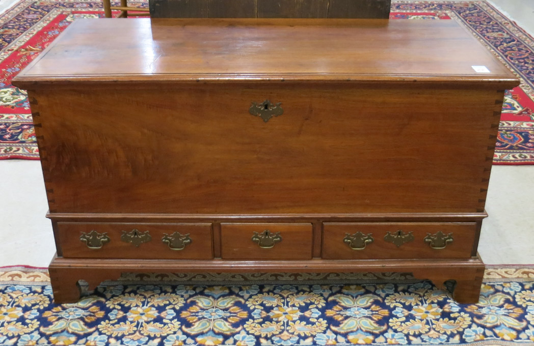 Appraisal: LIFT-TOP BLANKET CHEST American th century having three aligned drawers