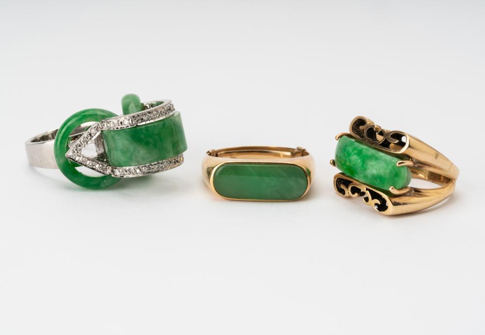 Appraisal: THREE ASSORTED KARAT GOLD JADE RINGSIncluding a karat yellow gold