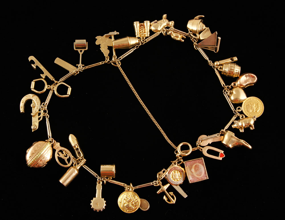 Appraisal: - K Gold Charm Bracelet K yellow gold charm bracelet