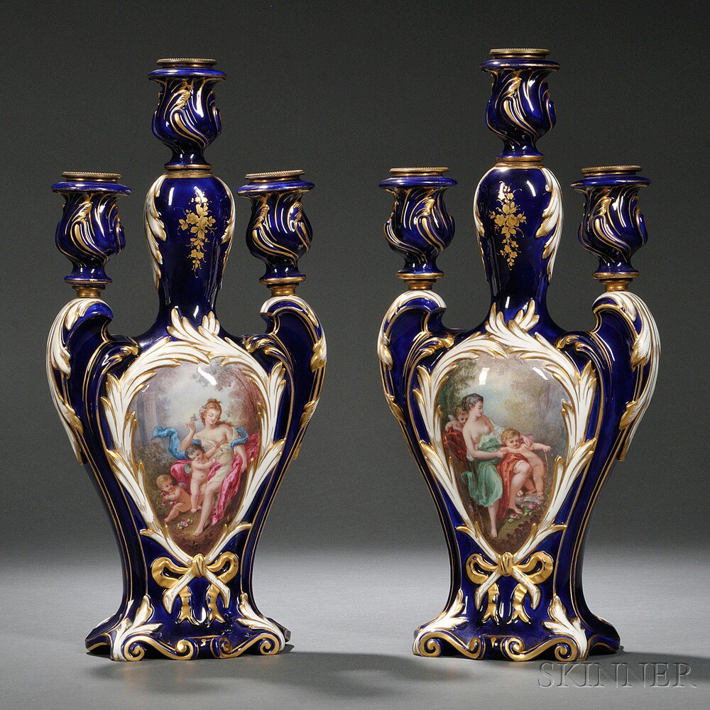 Appraisal: Pair of Sevres Porcelain Hand-painted Three-light Candelabra France th century