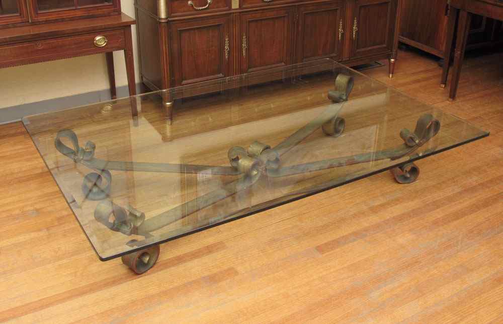 Appraisal: LARGE GLASS IRON COFFEE TABLE Beveled glass top with scroll