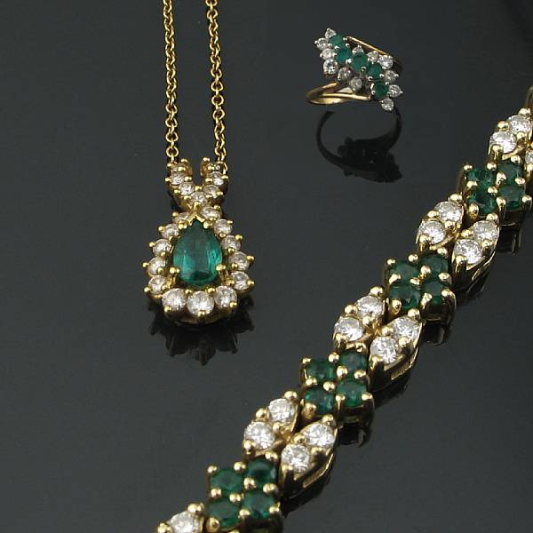 Appraisal: A group of emerald diamond and gold jewelry featuring one