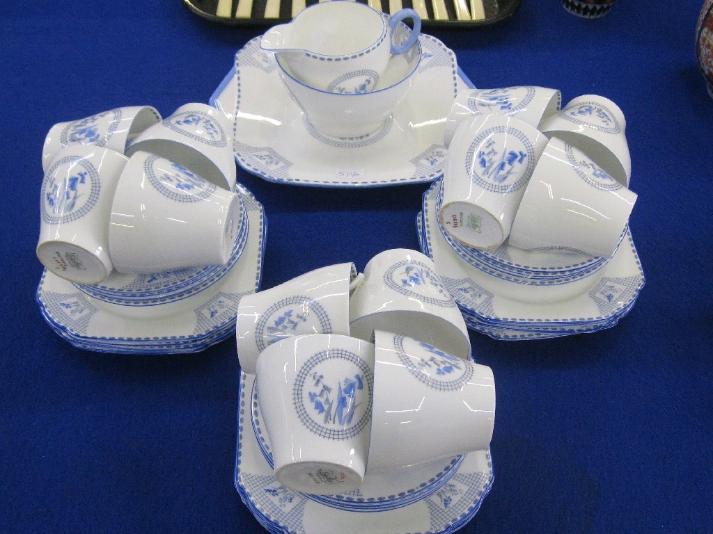 Appraisal: Shelly twelve setting teaset decorated with bluebells on a white