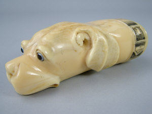 Appraisal: A th century whale tooth carved as the head of