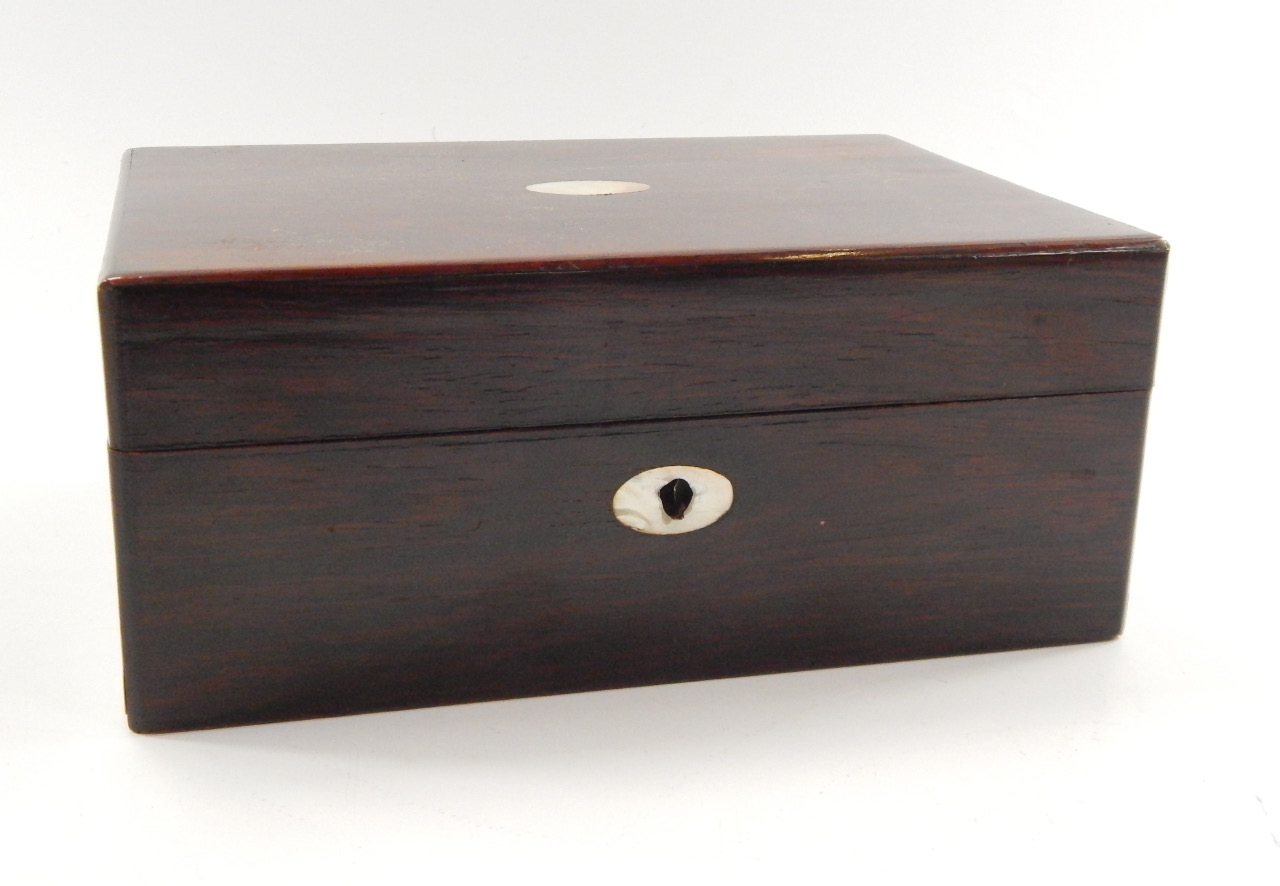 Appraisal: A Victorian rosewood and mother of pearl inlaid sewing box