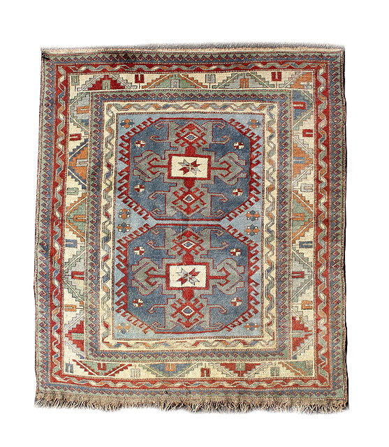 Appraisal: A MID TO LATE TH CENTURY POLYCHROME RUG with a