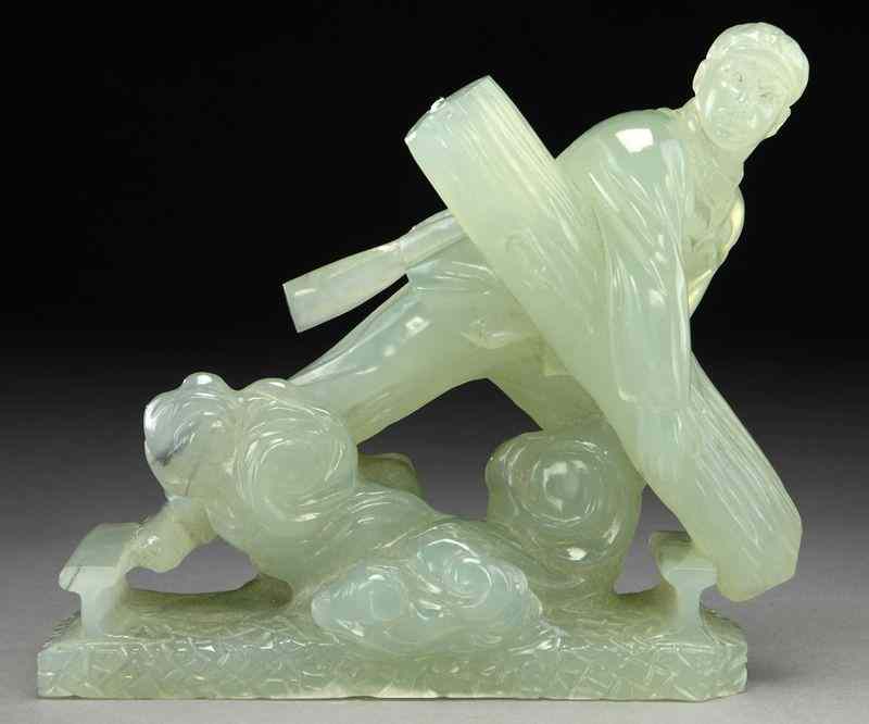 Appraisal: Chinese Cultural Revolution carved serpentine jadefigure depicting a soldier carrying