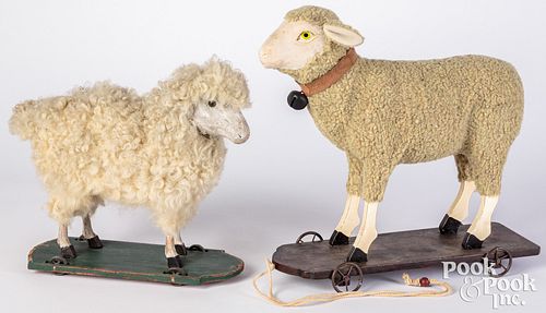 Appraisal: TWO LAMB PULL TOYSTwo lamb pull toys with painted composition