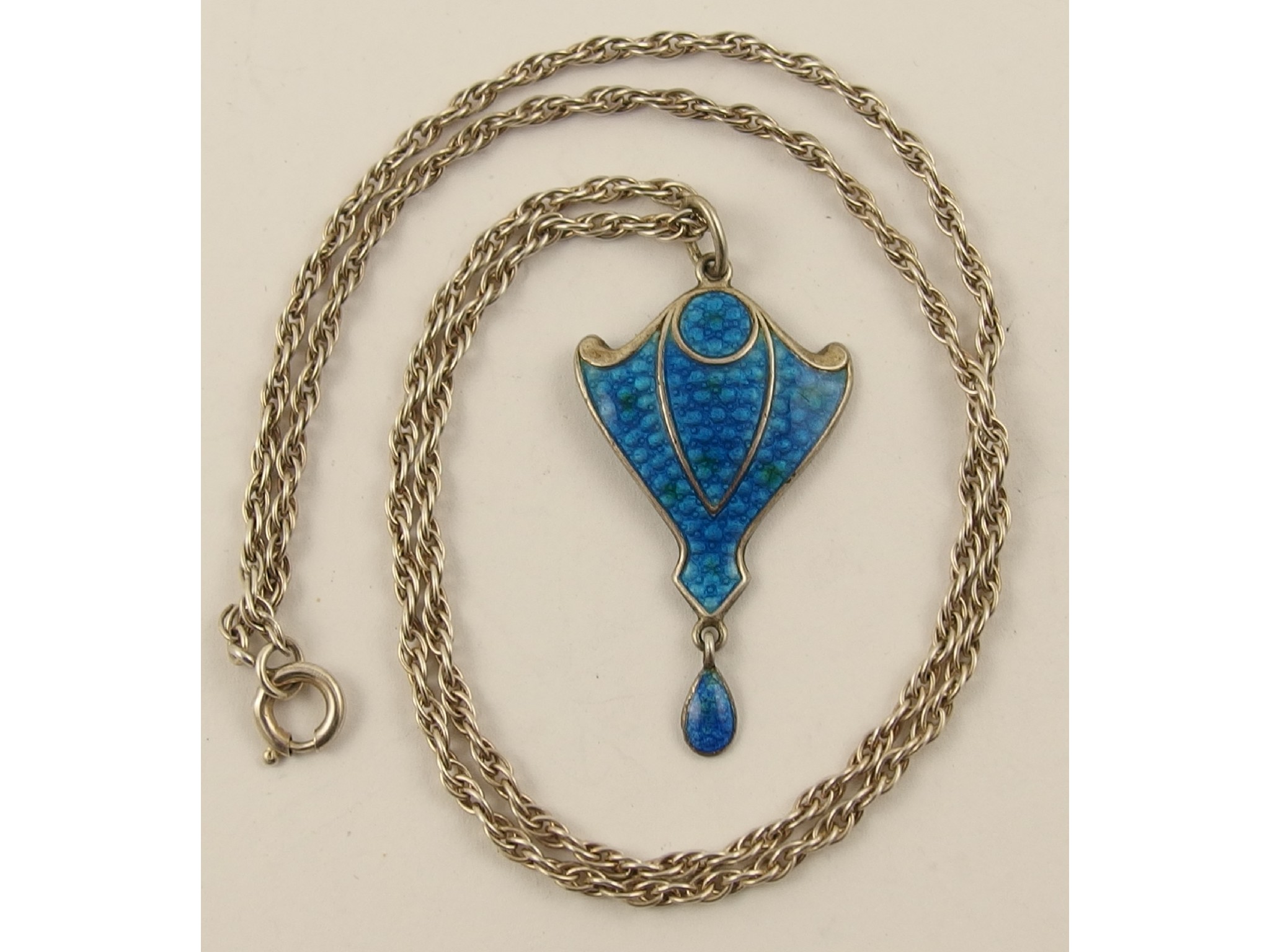 Appraisal: An Edwardian enamelled pendant with silver chain