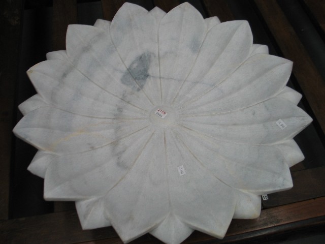 Appraisal: A hand carved white marble bowl in the shape of