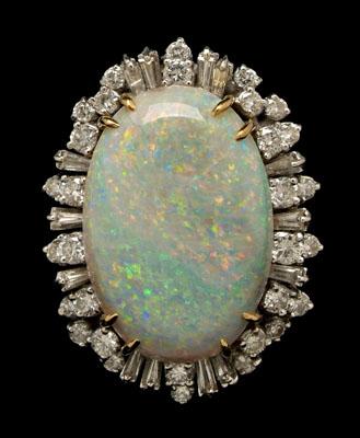 Appraisal: Opal diamond ring central oval cabochon white opal estimated weight