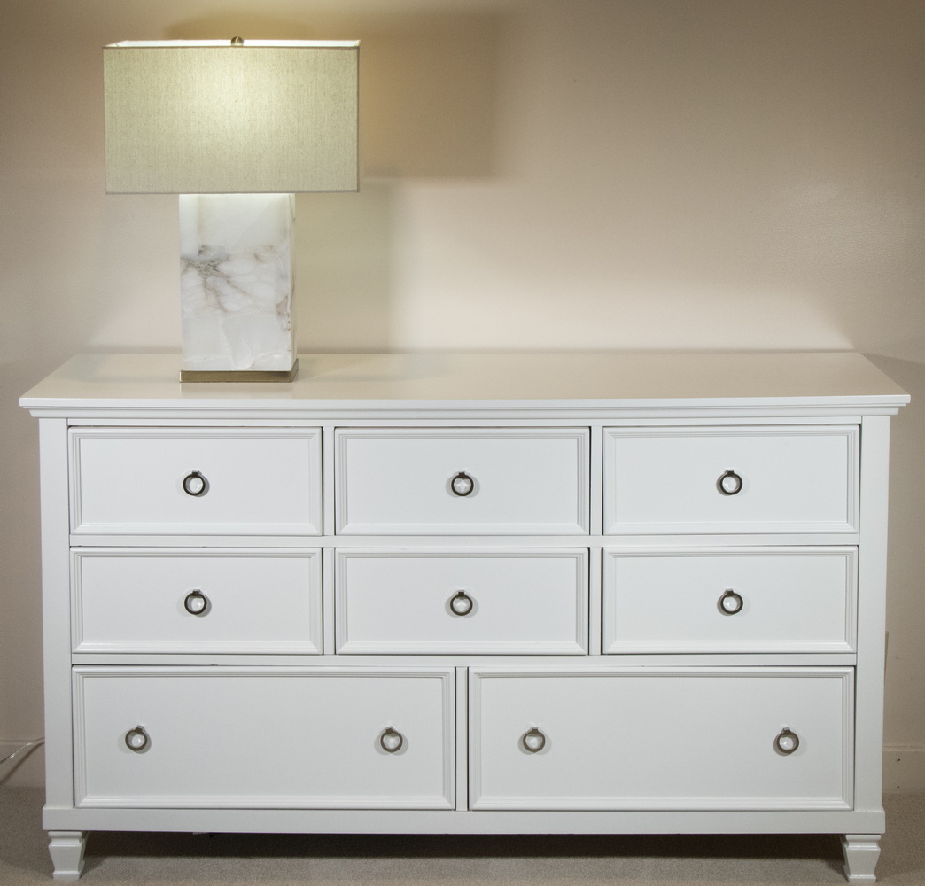 Appraisal: WHITE PAINTED DRAWER BUREAU Long eight-drawer bureau on raised legs