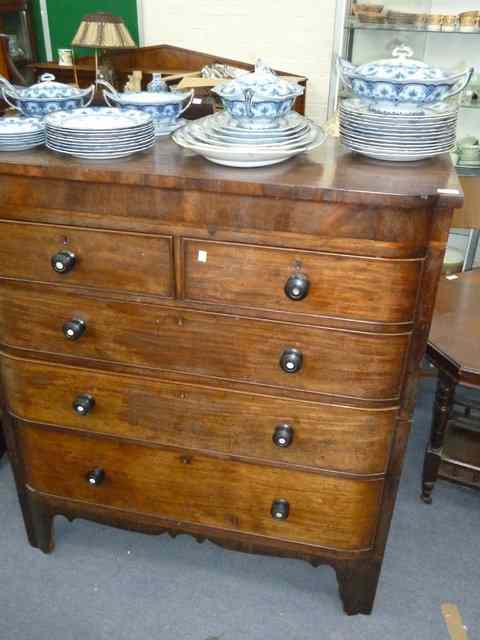 Appraisal: A VICTORIAN MAHOGANY BOW FRONTED COTTAGE CUT CHEST of two