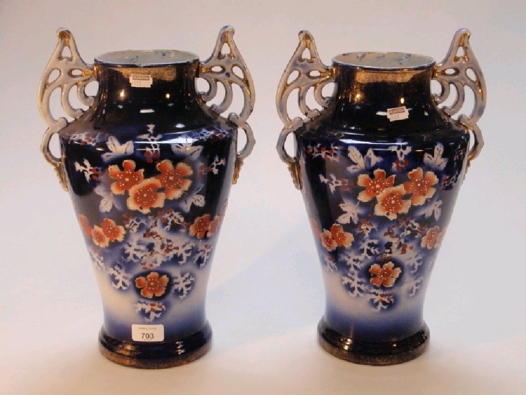 Appraisal: A pair of large Staffordshire vases