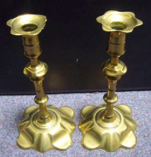 Appraisal: A pair of late th Century baluster brass candlesticks on