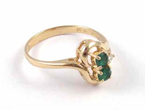 Appraisal: EMERALD DIAMOND AND YELLOW GOLD RING The k gold ring