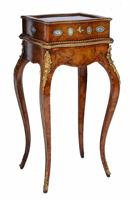 Appraisal: A VICTORIAN BURR WALNUT ROSEWOOD BANDED AND GILT METAL MOUNTED