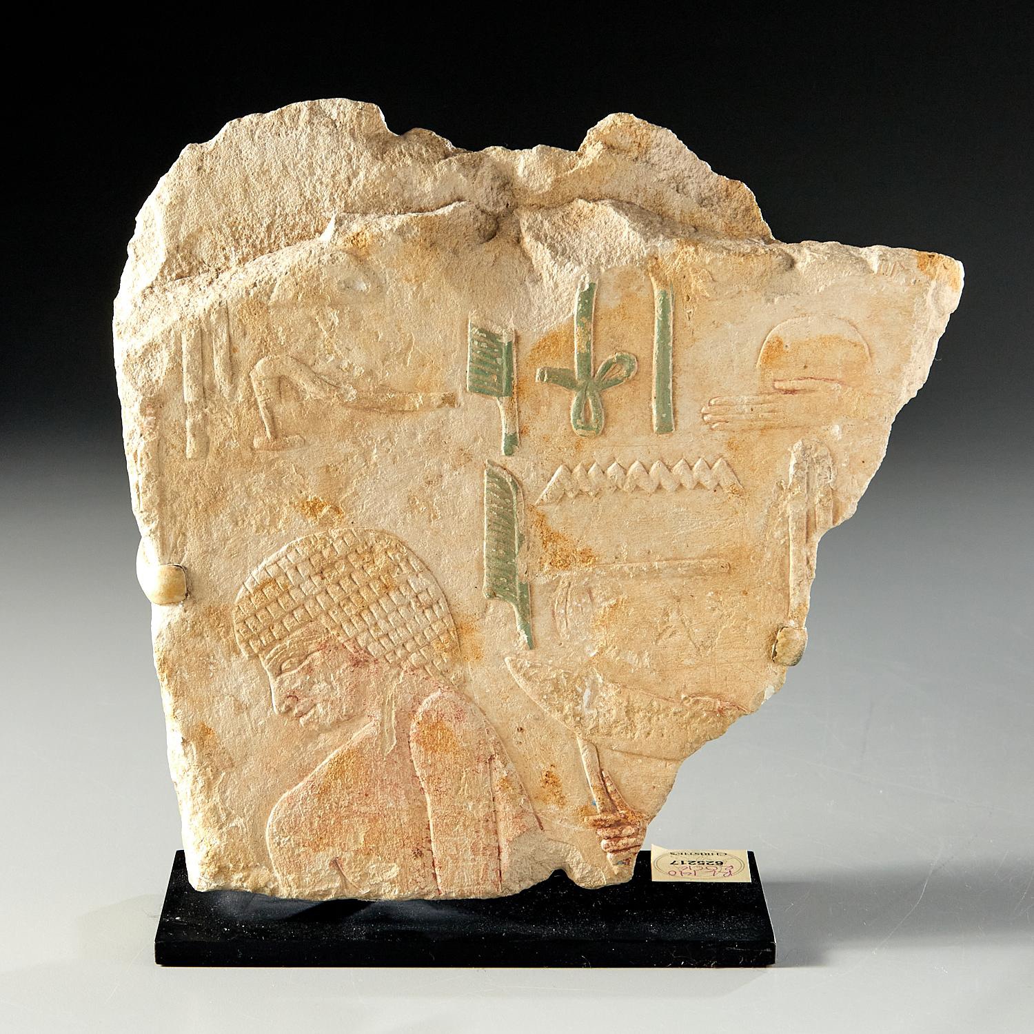 Appraisal: EGYPTIAN PAINTED LIMESTONE RELIEF FRAGMENT Old Kingdom BCE - BCE