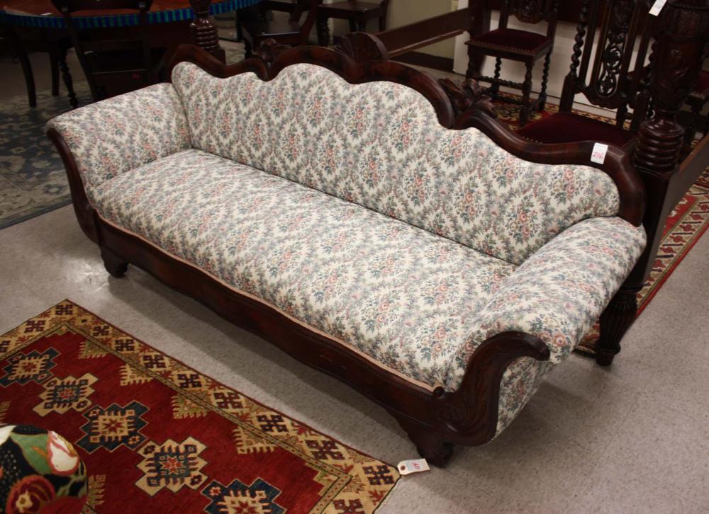 Appraisal: EMPIRE VICTORIAN MAHOGANY TRANSITIONAL SERPENTINE-BACK SOFA American - with later