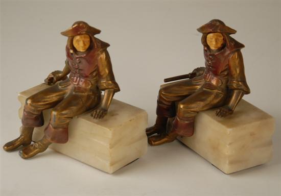 Appraisal: A Pair of Cold Painted Metal and Marble Figural Bookends