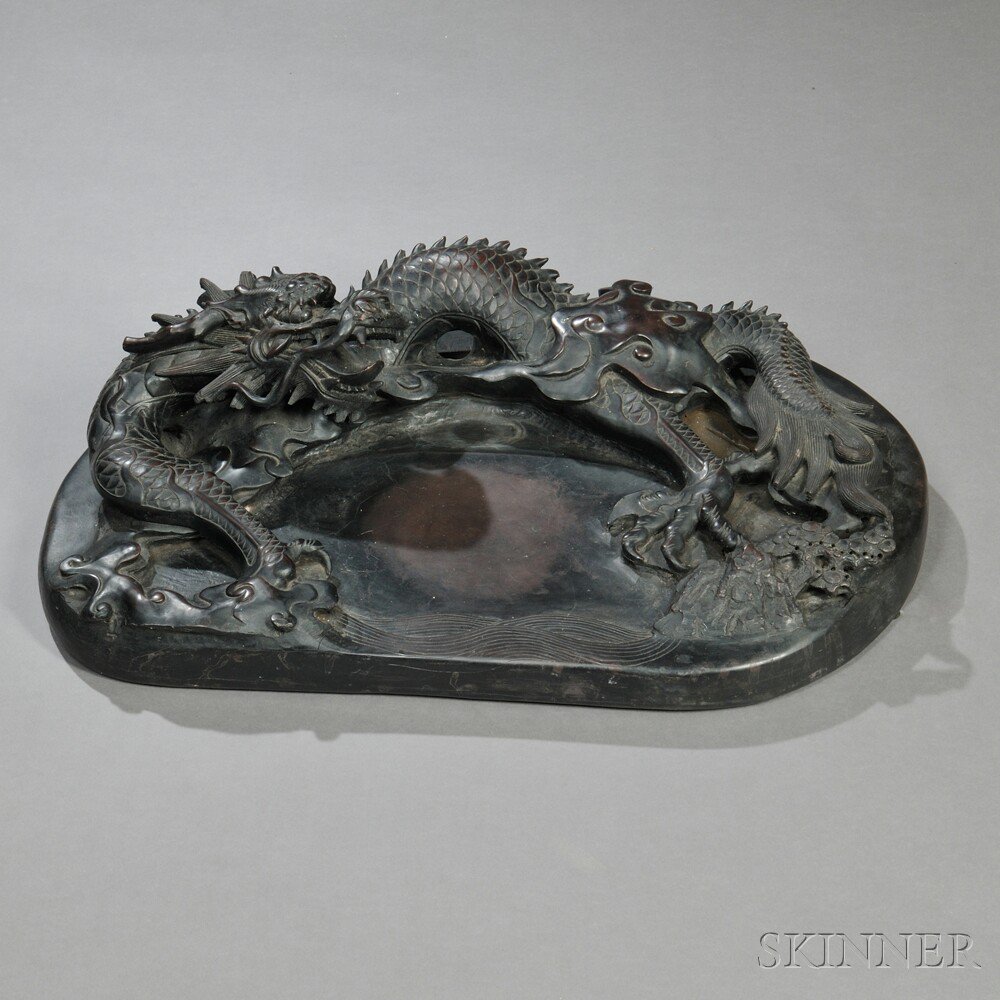 Appraisal: Large Inkstone China decorated with a carved dragon with pine