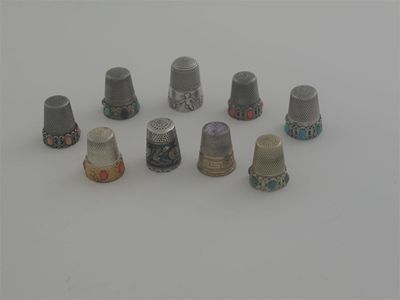 Appraisal: Six various continental thimbles set with stones paste a middle