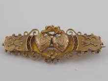 Appraisal: A carat gold bar brooch circa with applied double heart