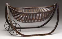 Appraisal: SALESMAN SAMPLE FIELD SLAVE CRADLE Canoe shaped cradle consisting of