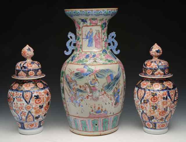 Appraisal: A CHINESE CANTONESE POLYCHROME ENAMEL TWO HANDLED VASE with figure