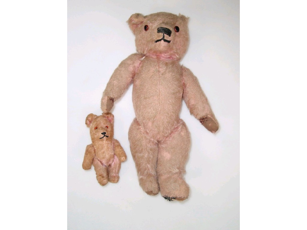 Appraisal: A pink teddy bear and a miniature pink bear cm