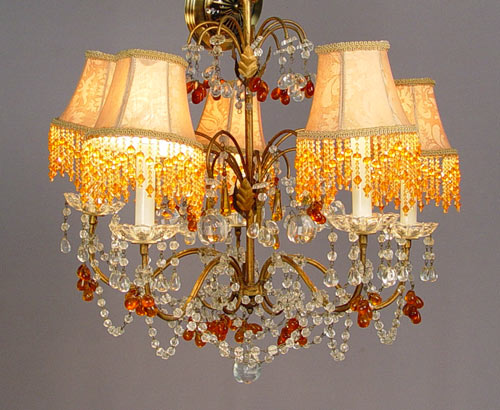 Appraisal: EARLY AMBER GLASS AND CRYSTAL LIGHT CHANDELIER Tiered chandelier with