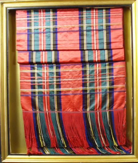 Appraisal: A Victorian Royal Stuart silk tartan scarf mounted and folded