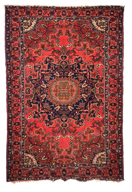 Appraisal: A HAMADAN TAFRESH ROSE GROUND RUG the central deep blue