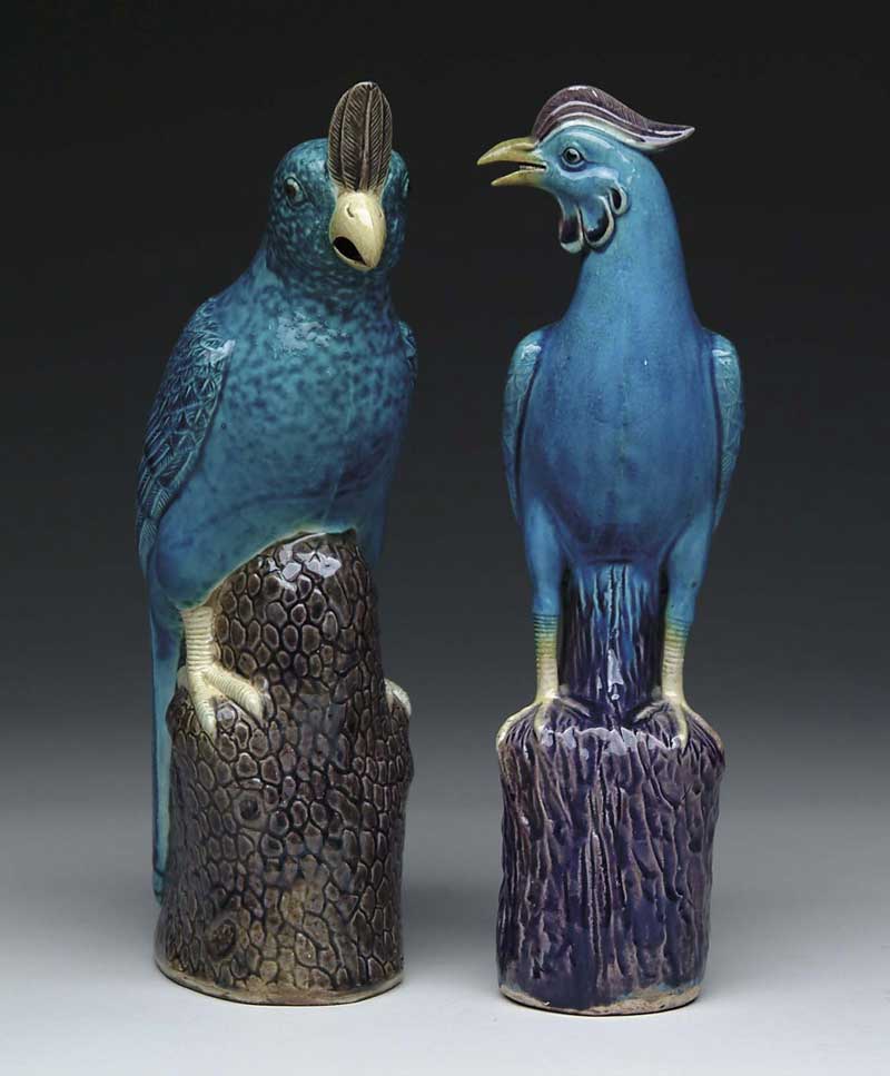 Appraisal: TWO SIMILAR CHINESE PORCELAIN BIRD FIGURES Each turquoise bird stands