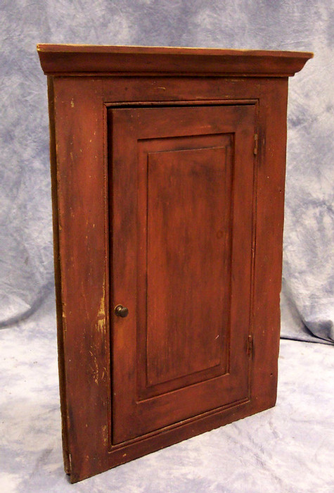 Appraisal: Pine hanging corner cupboard single raised panel door h corner