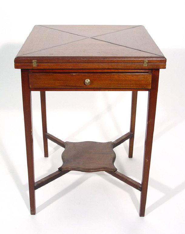 Appraisal: Edwardian mahogany fold up card table with swivel top and