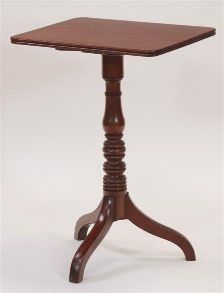 Appraisal: A th century mahogany tilt-top side table the reeded rounded