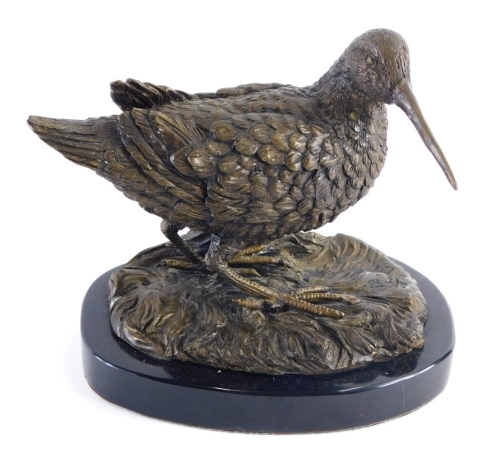 Appraisal: A thC bronze finish figure of a snipe on oval