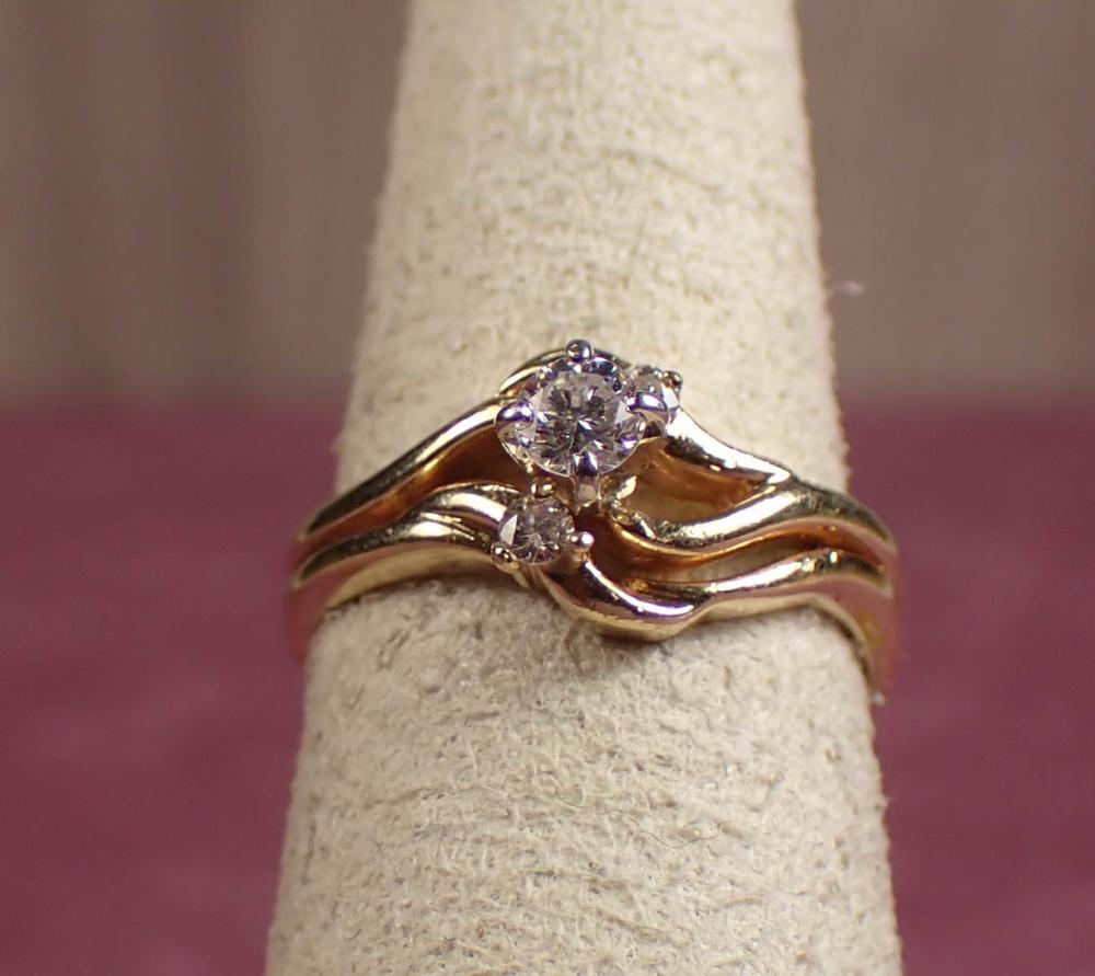 Appraisal: DIAMOND AND FOURTEEN KARAT GOLD RING The yellow gold ring