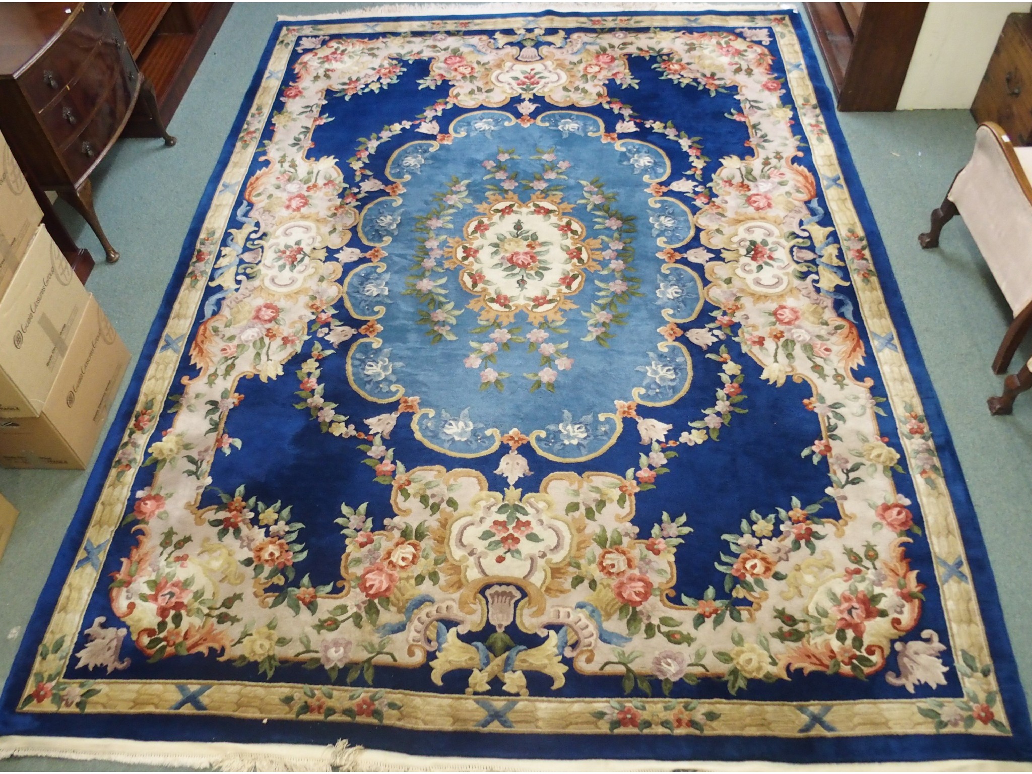 Appraisal: A blue ground Chinese rug x cm