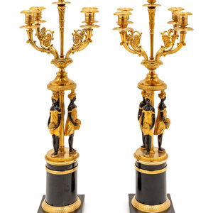 Appraisal: A Pair of Empire Style Gilt and Patinated Metal Figural