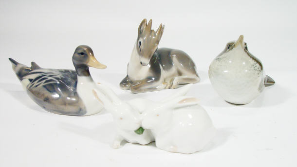 Appraisal: Four Royal Copenhagen porcelain animals all hand painted a bird