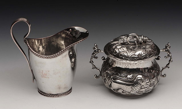 Appraisal: A BRITANNIA GRADE SILVER CAUDLE CUP AND COVER baluster shaped