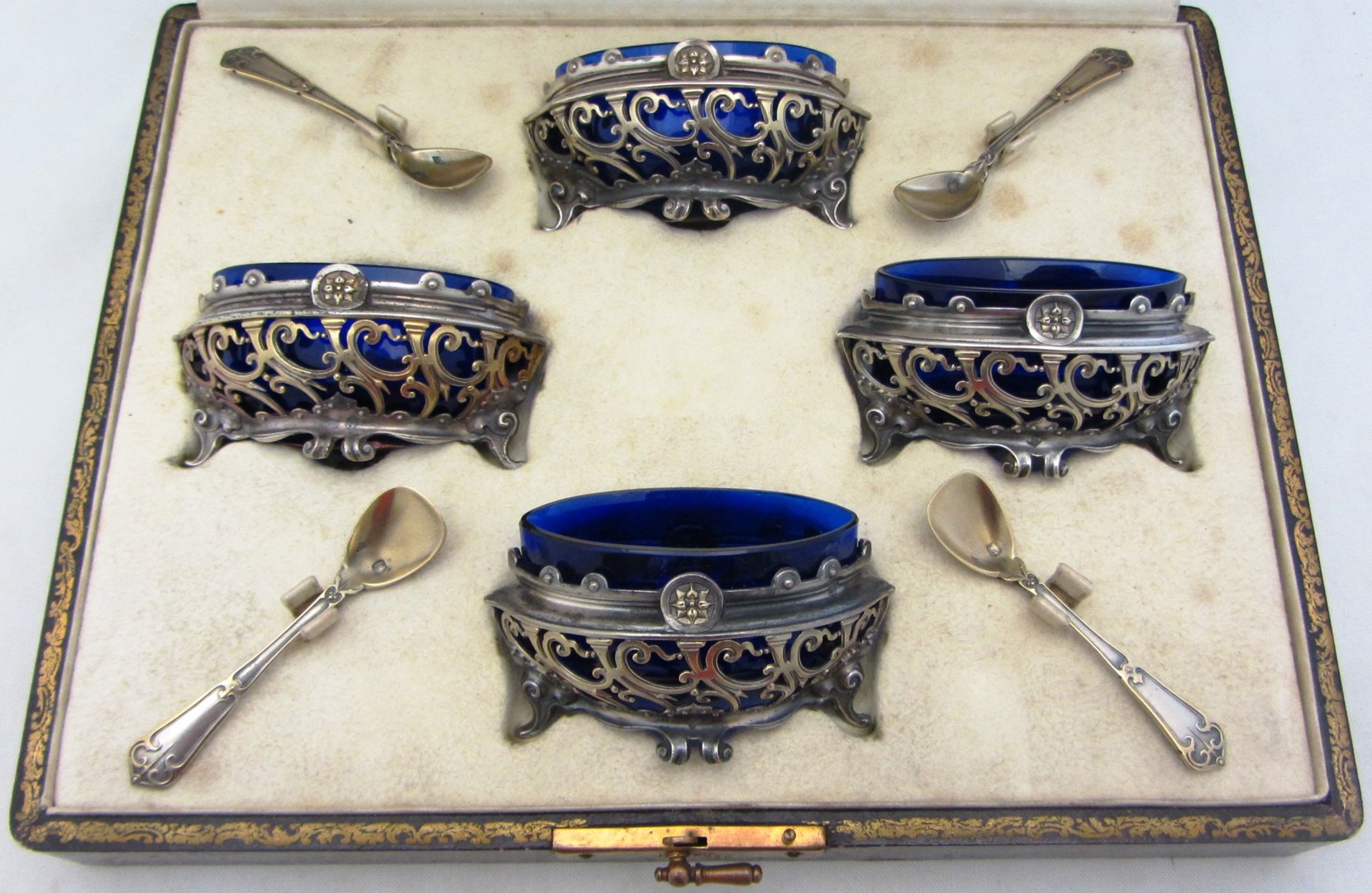 Appraisal: A set of four French oval salts with pierced scrolling